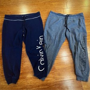 Calvin Klein performance joggers. 2 pairs included—perfect like new condition.
